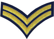 Hand Embroidered gold wire on navy blue cloth 2 Stripe Chevrons Corporal insignia badge