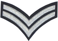 Embroidered silver wire on navy blue cloth 2 Stripe Chevrons Corporal insignia badge