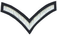 Embroidered silver wire on navy blue cloth 1 Stripe Chevron Lance Corporal insignia badge
