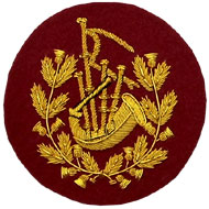 Hand Embroidered gold wire on red cloth wreathed bagpipes Pipe Major insignia badge