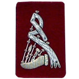 Embroidered silver wire on red cloth bagpipes insignia badge